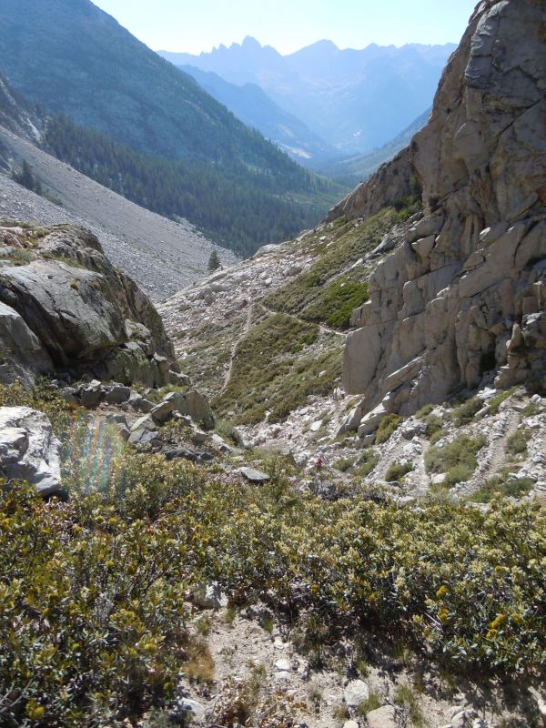 Looking down on golden Staircase (note, this picture is nearly taken vertically. notice angle of brush at my feet! also tiny hiker in middle of pic)
